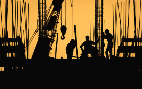 construction worker silhouette on the work place