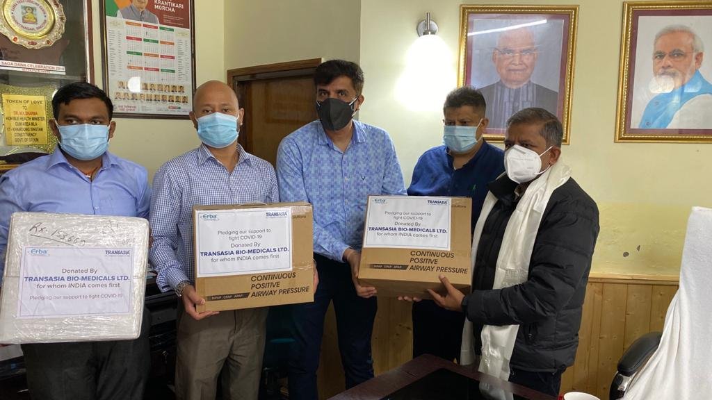 Dr. MK Sharma(first from right) and Sanjit Kharel(second from right) receiving the instruments from Arun Sharma from Transasia