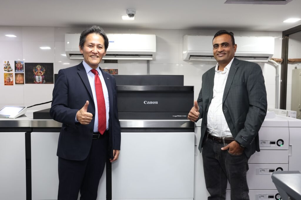 Picture 1 - Mr. Manabu Yamazaki, President and CEO, Canon India and Mr Rajesh Mandora, Owner, Prince Graphics with the newly-launched imagePRESS V1350